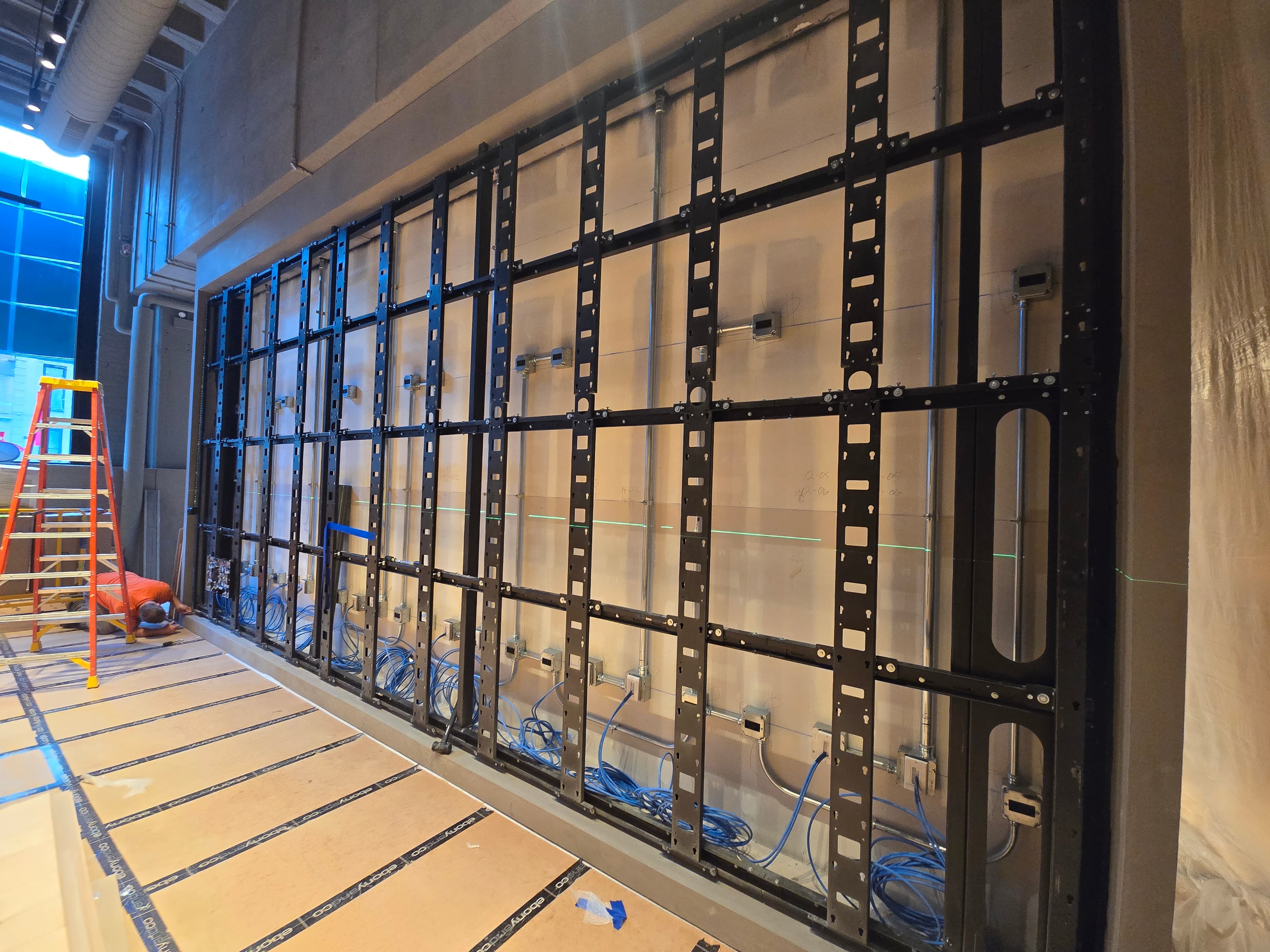Steel mounting frame and junction boxes for an LED video wall installation