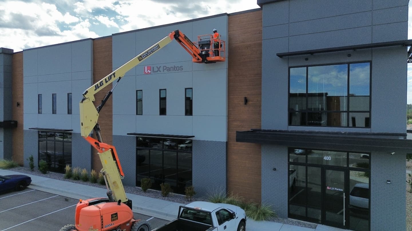 Boom lift install at the LX Pantos facility, wide exterior view