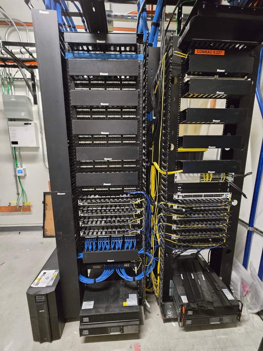 High-density server rack with fully populated patch panels and cable runs